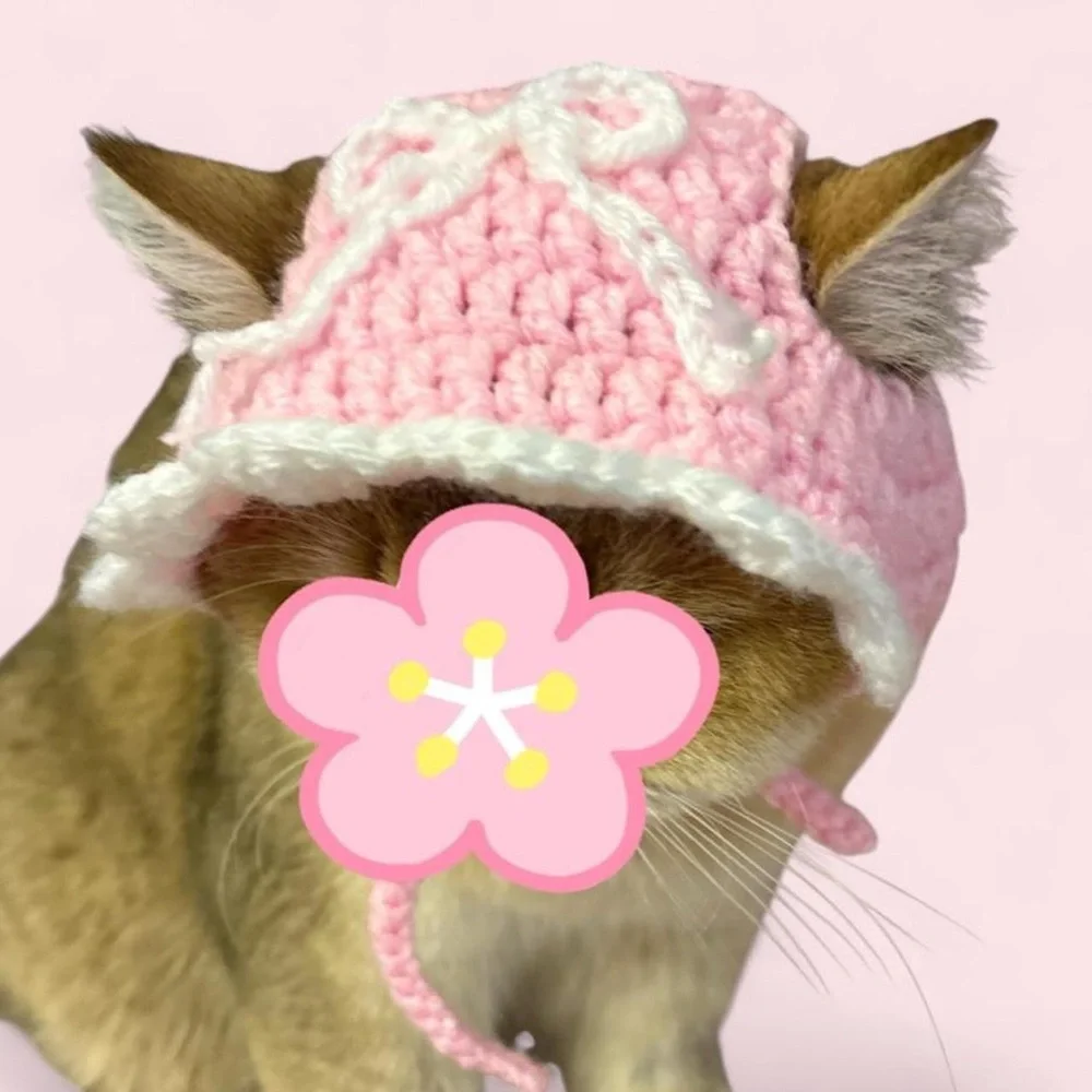 pink and white crochet bow hat for cats
